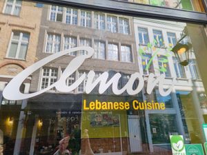Window sign at Amon in Bruges