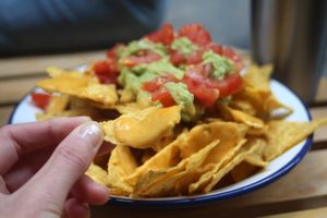 Vegan nachos with incredible home made plant based cheese and Fresh guacamole- not too spicy :) at NicPic in Malaga