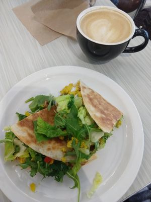 Breakfast Piadini & vegan maple latte at Brightside Kitchen in Des Moines