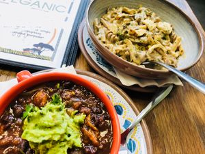 Sweet Potato Three Bean Chili bowl with the Almond Chardonnay Chedder Alfredo at  PLANT GOSSIP - powered by OrVeganic Kitchen in Coeur D Alene