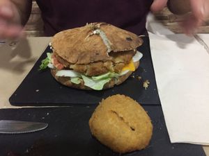 Burger and chorizo and gruyere croqueta  at Rustic Fusion in Madrid