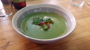 Soupe tiède d'épinards, tomates marinées à l'huile de noisette et basilic at Les Mauvaises Herbes in Lyon