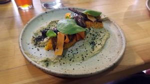 Galettes de pommes de terre et carottes, aubergines caramélisées au sésame noir, caviar d'aubergine at Les Mauvaises Herbes in Lyon