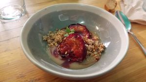 Nectarine rôtie, crème infusée au romarin at Les Mauvaises Herbes in Lyon