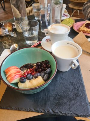 Bowl and cappuccino with almond milk at Say Yes in Ioannina