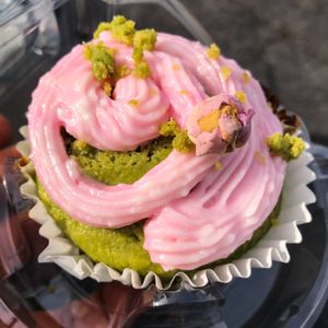 Spinach cupcake with rose water & pistachio topping  at The Thyme Pizzeria in Winnetka