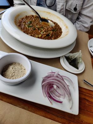Lentil soup with sides. Ask to have it without cheese - otherwise you will get three sides, one of them being goat cheese. The sides shown here are some Canarian flower and onions at Puerta Verde in Lanzarote
