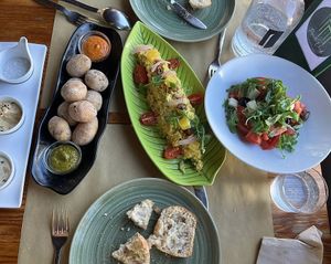 Wrinkled potatoes and bread for starters and the tabbouleh and tomato salad for mains. at Puerta Verde in Lanzarote
