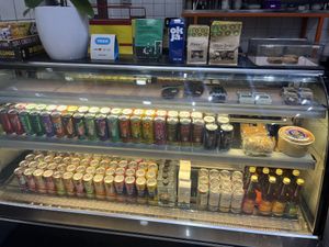 Front counter with array of drinks, takeout meals and sweets  at The Fussy Vegan - Blairgowrie in Johannesburg