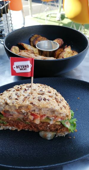 Beyond meat cheese burger with sweet potato fries at The Fussy Vegan - Blairgowrie in Johannesburg