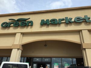 Outside sign  at Green Market Natural Foods in Sherman