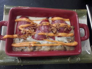 💚 Pimientos del piquillo rellenos de arroz con salsa. at Gaia in Burgos