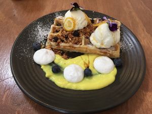 Special - blueberry and lemon waffles with vegan icecream, lemon curd, candied lemon, vegan meringue, blueberry crumble and fresh blueberries... wow!!! at One for the Crow in Maidstone
