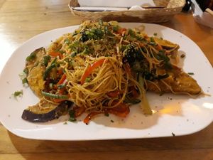 Huge plate of vegetarian soba at Zumo Food & Drink in Banos