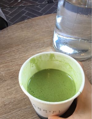 Hot matcha latte with coconut milk at Concrete Jungle Cafe in Chippendale