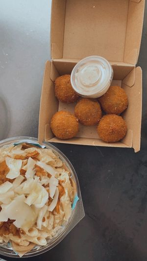 Was so impressed I had to get takeout too. Arancini and mac’n’cheese   at Dicki's in New Farm