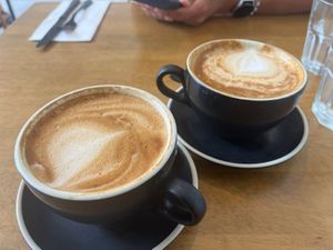 Oat flat white (left) and soy flat white (right). The soy flat whites are super creamy!  at Dicki's in New Farm