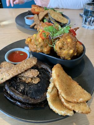 Corn fritters with extras  at Dicki's in New Farm