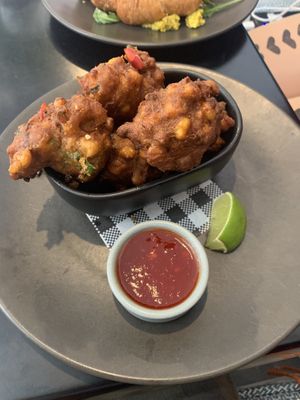 Corn Fritters with lime and chilli jam relish  at Dicki's in New Farm