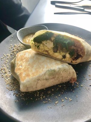 Breakfast Burrito (spiced rice, scrambled tofu, black beans, kale, salsa, hash brown wrapped in a soft tortilla) at Dicki's in New Farm