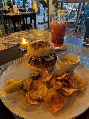 Unexpected burger with refresher drink at Cafe Tropical in Koh Lipe