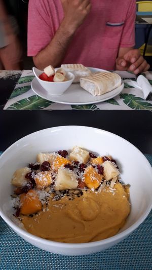 Golden morning and breakfast borrito at Cafe Tropical in Koh Lipe