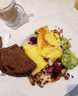 hippie hash with avo and added veg egg with pumpernickel at Anna's House - E Beltline in Grand Rapids