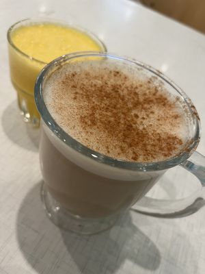 House-Made Chai Latte with Oatmilk and Fresh Squeezed Orange Juice  at Anna's House - E Beltline in Grand Rapids