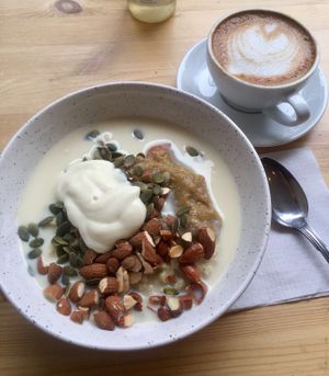 Millet porrige and cappucino with oat milk at Jord in Malmo