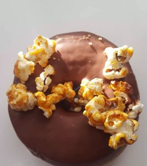 Friday donut with chocolate glaze and candied popcorn at Bageri Leve in Malmo