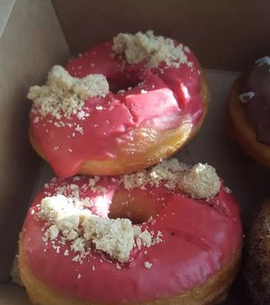 Friday donut with raspberry glaze and cookie crumbles at Bageri Leve in Malmo
