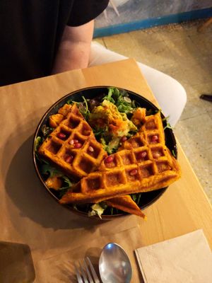 Sweet potato with salad, pomegranate, guacamole. at Riz Riz - Marais in Paris