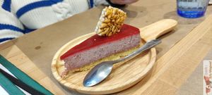 Raspberry Mirror Cheesecake

cashew and raspberry cheesecake, raspberry mirror coulis on almond shortcrust pastry at Riz Riz - Marais in Paris