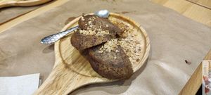 Banana Bread

deliciously moist cake with caramelized bananas, topped with crushed almonds  at Riz Riz - Marais in Paris