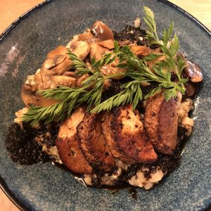 Mushroom risotto! Risotto was very flavorful and the tofu on the top tasted so good. at Riz Riz - Marais in Paris