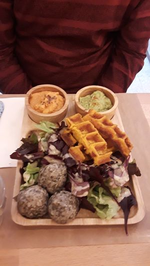 Appetizer "Discovery to share"... salad, sweet potato pancakes, guacamole and little b balls of rice delicious!  at Riz Riz - Marais in Paris