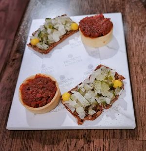 Snacks - tomato concasse tartlet, and pickled kohlrabi on a seeded cracker at Brown's in Londonderry