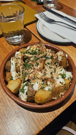 Loaded potatoes, needed more sauce at Bam Bam Italian in Avonsleigh