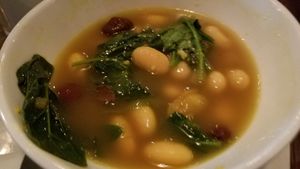 Beans-N-Greens ~ a small plate of heirloom beans and braising greens with white wine and lemon. at Wild Goat Bistro in Petaluma