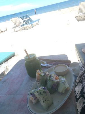 Fresh spring rolls and green juice😄 at The Fisherman Vegan Restaurant   in Hoi An