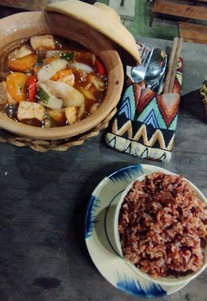 Braised tofu and mushroom in clay pot with red rice, so yum! at The Fisherman Vegan Restaurant   in Hoi An