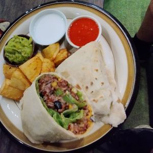 Mexican wrap+extra side, a must to try! at The Fisherman Vegan Restaurant   in Hoi An