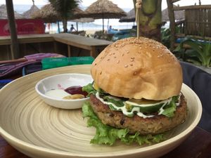 Vegan burger served with sweet potatoes. Ups ! Potatoes were gone in no time. at The Fisherman Vegan Restaurant   in Hoi An