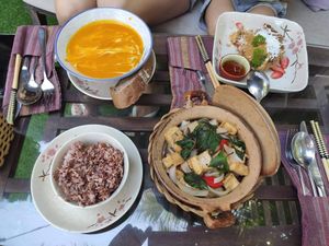 Pumpkin soup with coconut cream (very good), braised tofu and mushroom in claypot (very good!) and vegan pancakes at The Fisherman Vegan Restaurant   in Hoi An