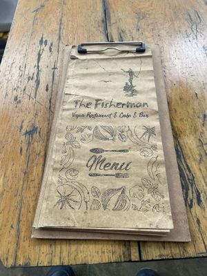 Front of menu  at The Fisherman Vegan Restaurant   in Hoi An