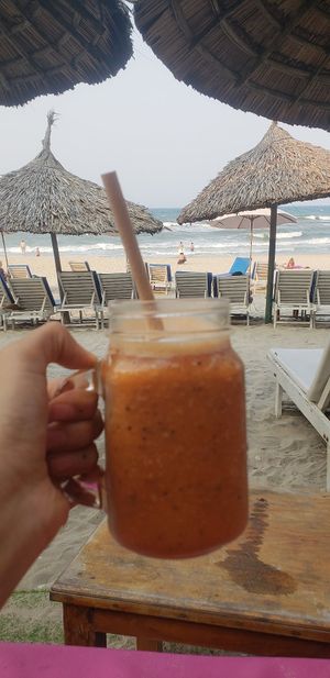 yummy smoothie and a great view at The Fisherman Vegan Restaurant   in Hoi An