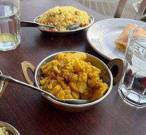 Cauliflower and potatoes curry  at All India Cafe in Glendale