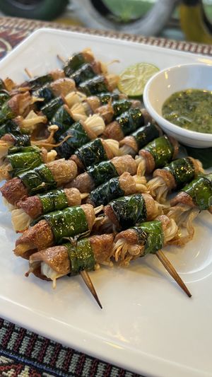 Enoki mushrooms with fake meat and lolot leaves. So delicious!  at Phong Nha Vegan in Phong Nha