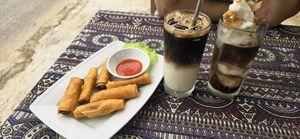 Fried spring rolls, specialty coffees at Phong Nha Vegan in Phong Nha