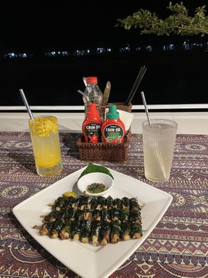 View (in the night) with passion fruit soda (left) and lemonade (right)  at Phong Nha Vegan in Phong Nha